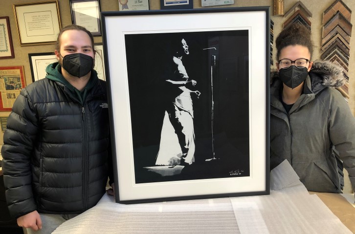 Jackie
                                and her Billie Holiday frame with Museum
                                Glass