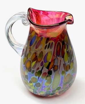 Small
                      pitcher with red inside