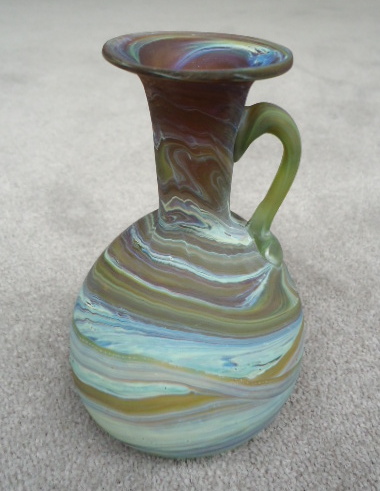 Long neck vase with
                  bulb bottom and handle 5"