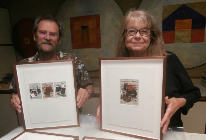 Ray
                                    and Patty with their framing
                                    Hratchya etchings