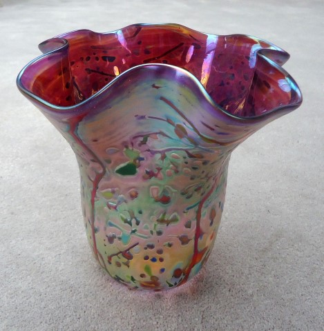 Confetti on violet fluted vase