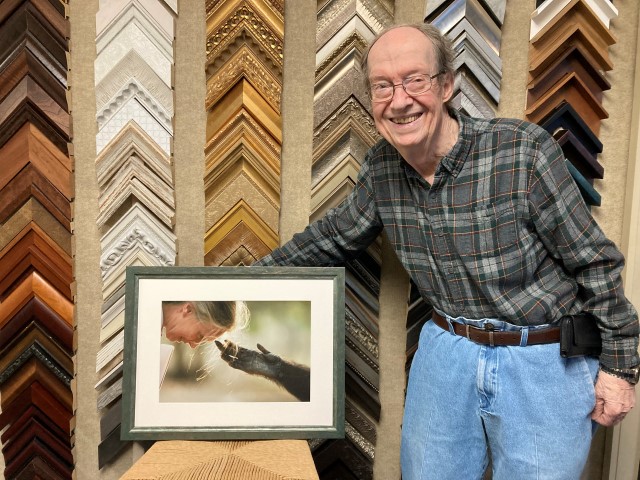 Lars
                      with custom frame for Jane Goodall photo